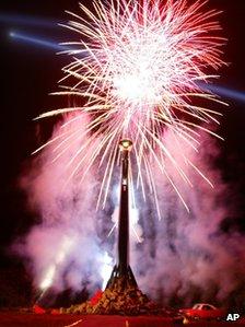 Fireworks carrying the ashes of Hunter S Thompson explode over the top of his memorial on the Owl Farm in Woody Creek, Colorado