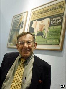 Peter Sachs with two posters fro his father's collection