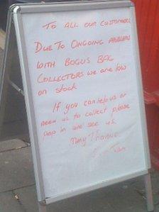 Sign explaining charity bags are being stolen