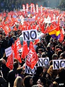 People gather on February 19 2012 in central Madrid during a demonstration against sweeping labour market reforms