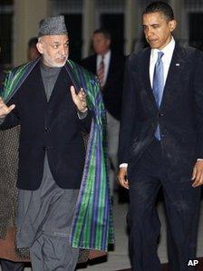 President Barack Obama meets with Afghan President Hamid Karzai, left, at the presidential palace in Kabul, Afghanistan, Sunday, March 28, 2010.