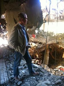 Peter Taylor in the ruins of Musa Kusa's Tripoli HQ, which was bombed by Nato