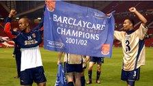 Wiltord (left) enjoys the moment in an empty Old Trafford