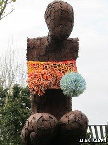 Yarn-bombed statue