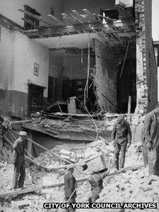 People inspect the damage to Bar Convent's East Wing