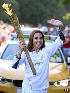 Melanie C carries the Olympic flame