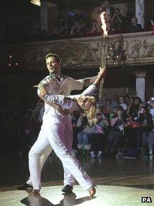 Harry Judd and dancer Aliona Vilani dance the flame across the ballroom