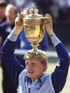 Boris Becker lifting his first Wimbledon trophy in 1985