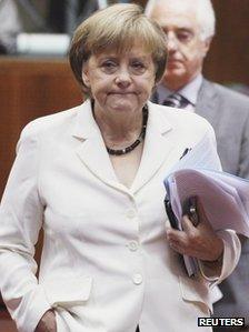 Germany's Chancellor Angela Merkel arrives to attend an European Union leaders' summit in Brussels, 29 June 2012