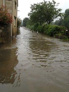 Water covering the main road in Brookhouse near Rotherham