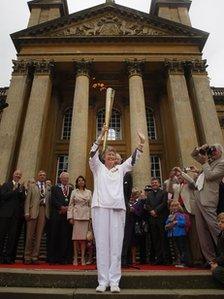 Torchbearer Pat Pearce MBE outside Blenheim Palace