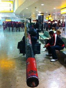 US pole vaulter Brad Walker waits in Terminal 1