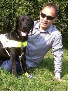 John Tovey with guide dog Dez