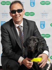 John Tovey with guide dog Dez