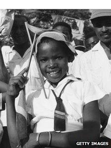 Girl with flag during Jamaica's independence celebrations