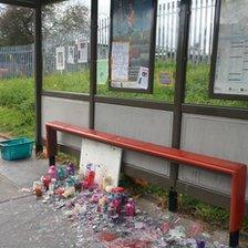 Candles at the bus stop near Tia's