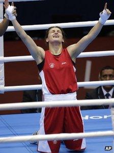 Katie Taylor celebrates her win over Russia's Sofya Ochigava