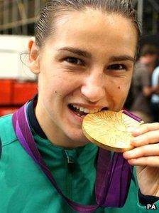 Katie Taylor poses with her gold medal