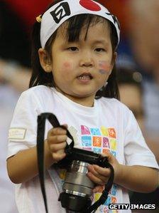 Family atmosphere - a young fan at the Japan v South Korea bronze medal match in Cardiff