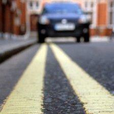 Car parked on double yellow line