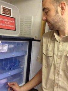 Daniel Hall with the anti-venom stored in a fridge