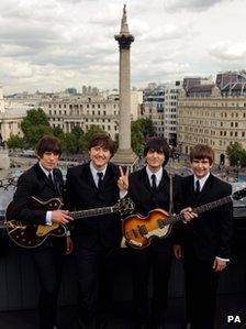 Performers from Let It Be pictured in central London