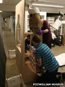 Egyptian mummy case being restored