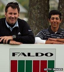 Sir Nick Faldo congratulates Jack Singh-Brar of England after The Faldo Series Grand Final at the Lough Erne resort in Northern Ireland