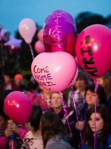 Pink balloons with messages for April