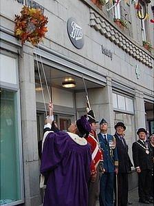 Wreath raised under the Sir Isaac Brock plaque on Boots in St Peter Port, Guernsey