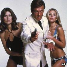 Maud Adams, Roger Moore and Britt Ekland from the 1974 film The Man with the Golden Gun