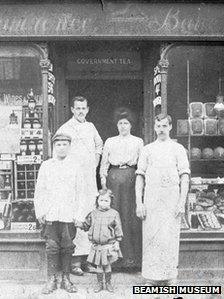 Staff outside an Edwardian bakery