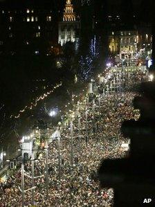 Party-goers on Princes Street in Edinburgh, Scotland crowd during a part of the New Year 2013 Edinburgh Hogmanay celebrations