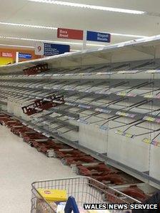 Empty bread shelves Tesco