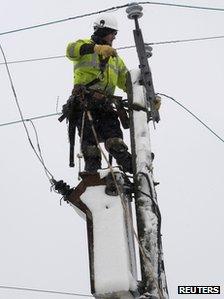 An engineer repairs a fallen power cable near Narberth