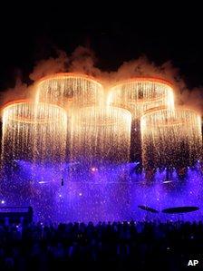 The Olympic Rings are forged above the stadium during the Opening Ceremony