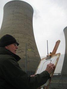 Robin Mason drawing a picture with charcoal