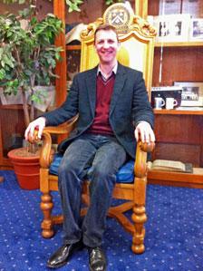 Mark in the headmaster's chair