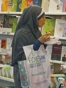 A visitor at 30th Annual Meeting of France's Muslims at Le Bourget, 29 March, 2013