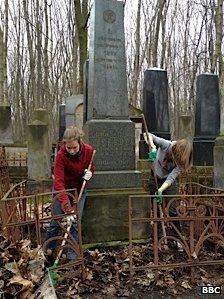 Volunteers clearing up the Jewish cemetery in Warsaw