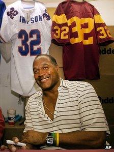 OJ Simpson signs autographs during an event hosted by the NecroComicon horror convention in Northridge, California