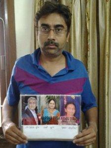 Mitesh Goradia with pictures of his mother and cousin