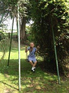 Girl on old Wicksteed swing