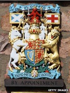 Royal Warrant on a wall outside a shop in Ballater