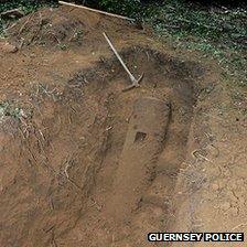 A half-buried WWII bomb