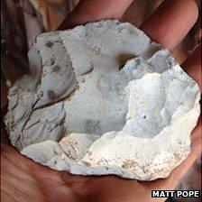 Hand held stone is a Neanderthal scraping tool from Petit Portelet near Gorey