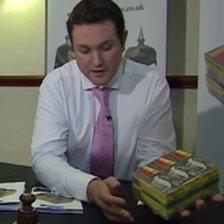 Matthew Tredwin with the unopened boxes of cars
