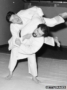 Sir Roger Moore in training for his role in The Saint in 1965