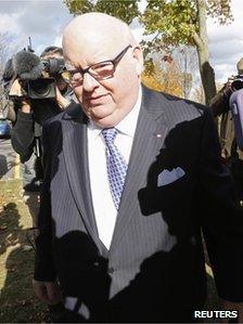 Senator Mike Duffy arrived at Parliament Hill in Ottawa on 22 October 2013