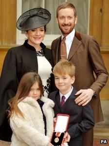 Sir Bradley Wiggins with his wife and children